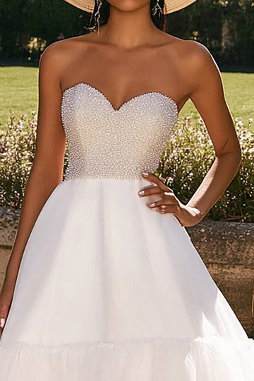 White Strapless Tiered A Line Wedding Dress With Beading